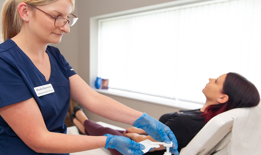 Nicola Haywood carrying out a skin treatment in her Wakefield clinic using Cliniccare skincare products